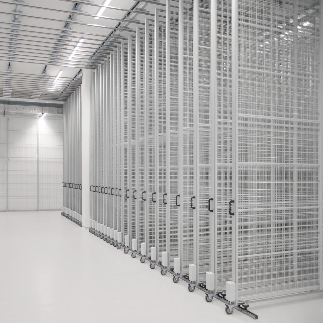 Ceiling-running system with linear guides